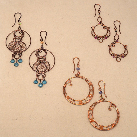 Three pairs of copper earrings